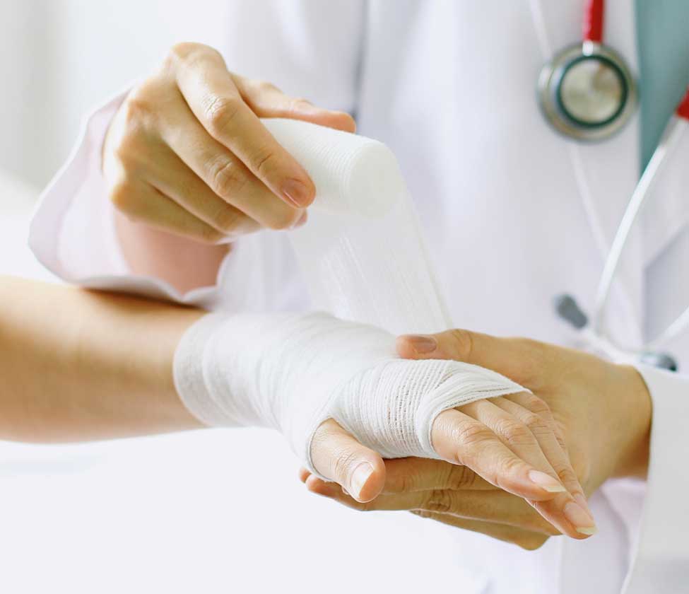 Photo of a hand being bandaged