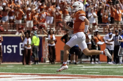 Quinn ewers running with football